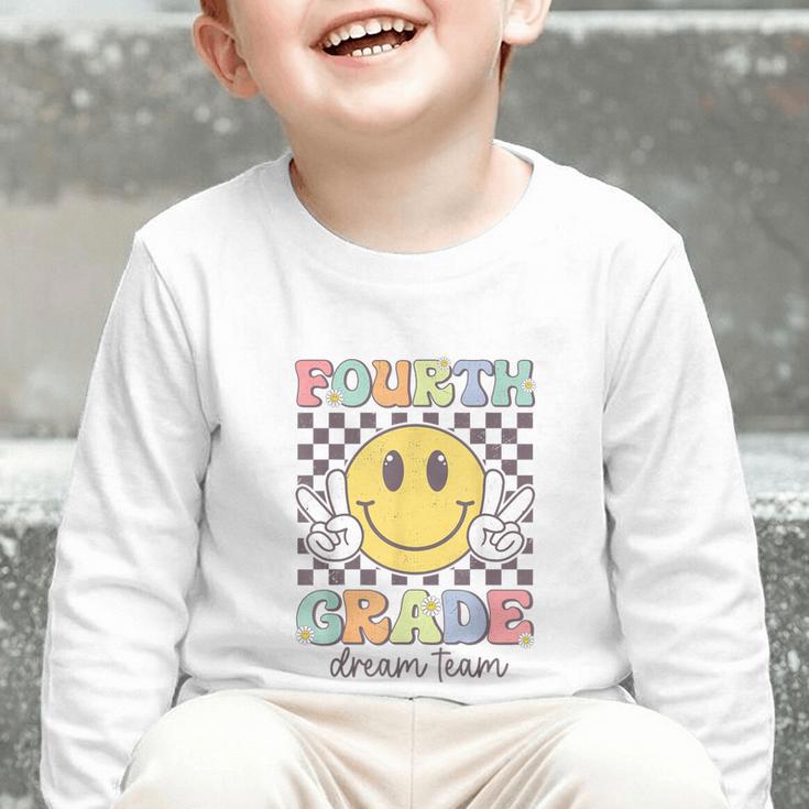 Fourth Grade Dream Team Smile Face Back To School 4th Grade Graphic Toddler Long Sleeve Tee Fourth Grade Dream Team Smile Face Back To School 4th Grade Graphic Toddler Long Sleeve Tee