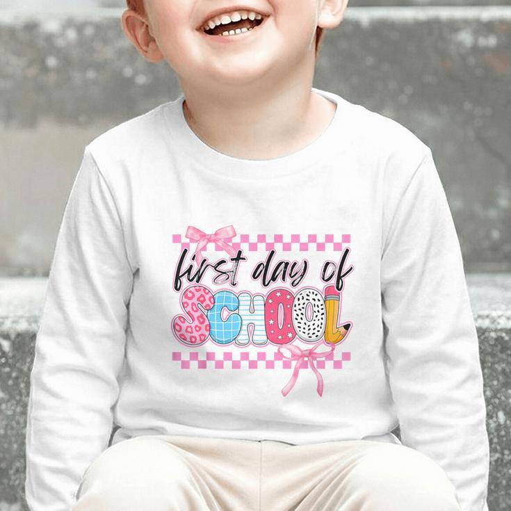 Girl First Day Of School Coquette Bow Pink Back To School Graphic Toddler Long Sleeve Tee