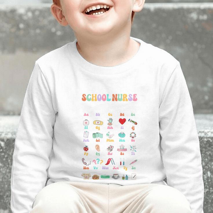 Groovy Cute ABC School Nurse Alphabet Back To School Women Graphic Toddler Long Sleeve Tee Groovy Cute ABC School Nurse Alphabet Back To School Women Graphic Toddler Long Sleeve Tee