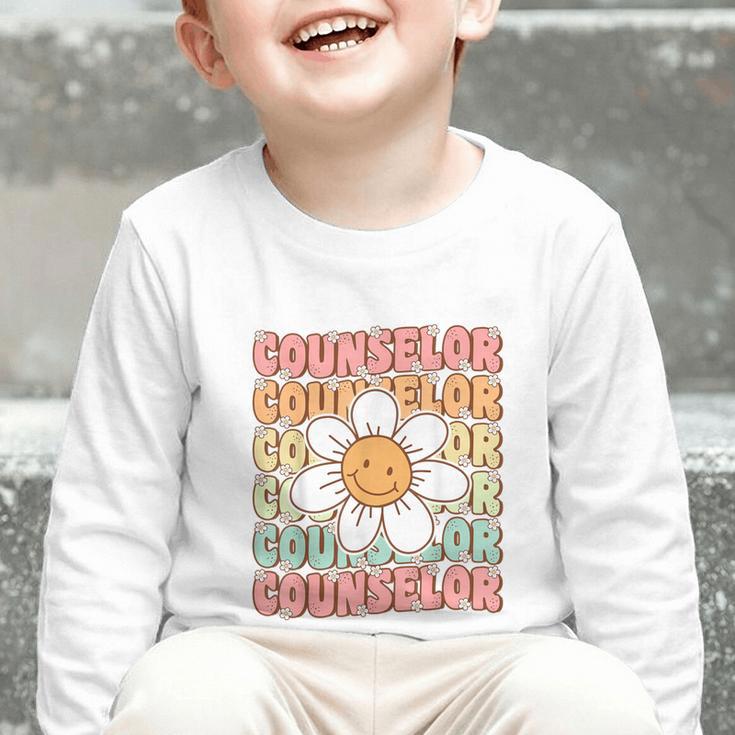 Groovy School Counselor Cute Daisy Flower Back To School Graphic Toddler Long Sleeve Tee Groovy School Counselor Cute Daisy Flower Back To School Graphic Toddler Long Sleeve Tee