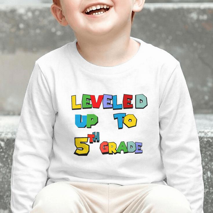Leveled Up To 5th Grade Back To School Kids Boys Premium Tri-Blend Graphic Toddler Long Sleeve Tee Leveled Up To 5th Grade Back To School Kids Boys Premium Tri-Blend Graphic Toddler Long Sleeve Tee