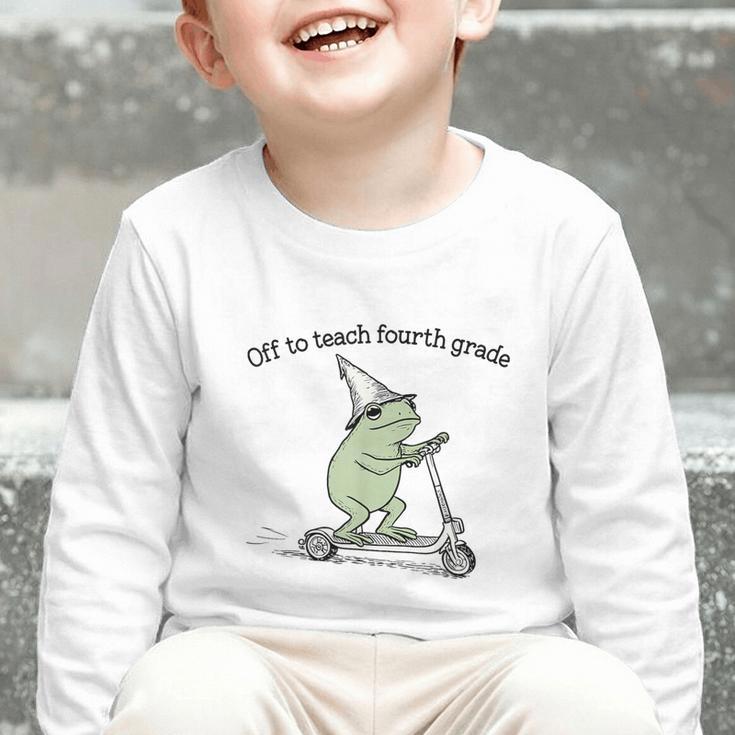 Off To Teach Fourth Grade Froggy Cute Frog Back To School Graphic Toddler Long Sleeve Tee Off To Teach Fourth Grade Froggy Cute Frog Back To School Graphic Toddler Long Sleeve Tee