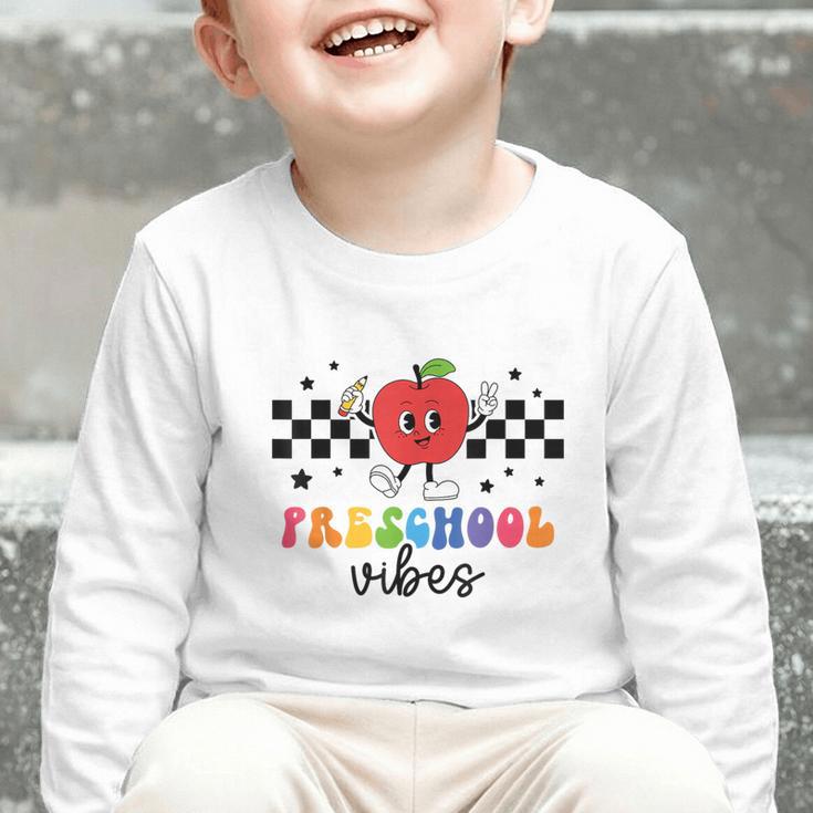 Preschool Vibes Retro Groovy Apple Back To School Graphic Toddler Long Sleeve Tee Preschool Vibes Retro Groovy Apple Back To School Graphic Toddler Long Sleeve Tee