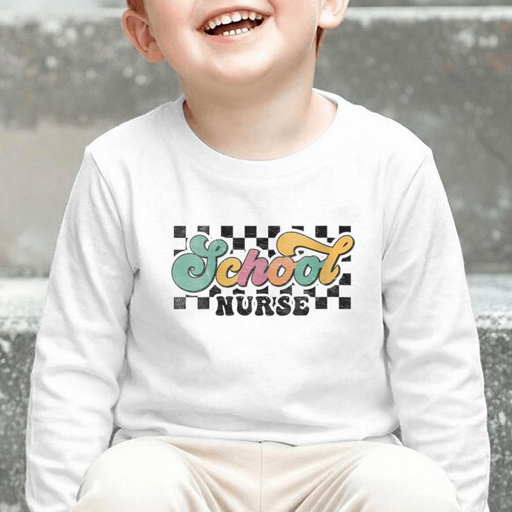 Retro Checkered School Nurse Squad Back To School Graduation Graphic Toddler Long Sleeve Tee Retro Checkered School Nurse Squad Back To School Graduation Graphic Toddler Long Sleeve Tee