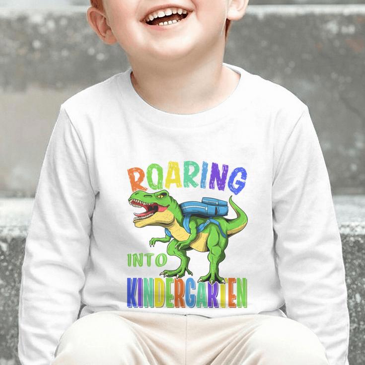 Roaring Into Kindergarten DinosaurRex Back To School Boys Performance Graphic Toddler Long Sleeve Tee Roaring Into Kindergarten DinosaurRex Back To School Boys Performance Graphic Toddler Long Sleeve Tee