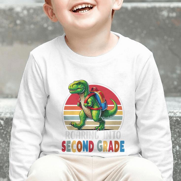 Roaring Into Second Grade T-Rex Back To School 2nd Grade Premium Tri-Blend Graphic Toddler Long Sleeve Tee Roaring Into Second Grade T-Rex Back To School 2nd Grade Premium Tri-Blend Graphic Toddler Long Sleeve Tee