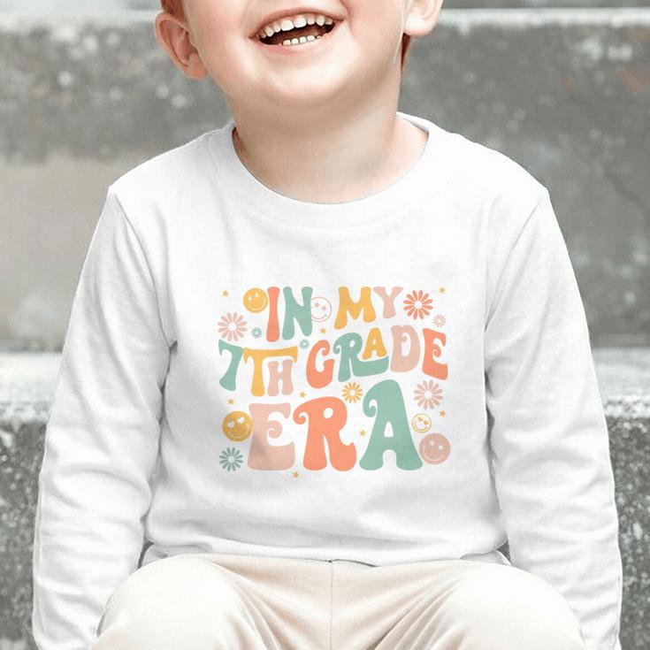 In My Seventh Grade Era Retro 7th Grade Back To School Premium Tri-Blend Graphic Toddler Long Sleeve Tee In My Seventh Grade Era Retro 7th Grade Back To School Premium Tri-Blend Graphic Toddler Long Sleeve Tee