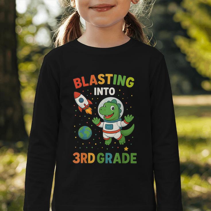 Blasting Into 3rd Grade Dinosaur Astronaut Back To School Graphic Toddler Long Sleeve Tee Blasting Into 3rd Grade Dinosaur Astronaut Back To School Graphic Toddler Long Sleeve Tee