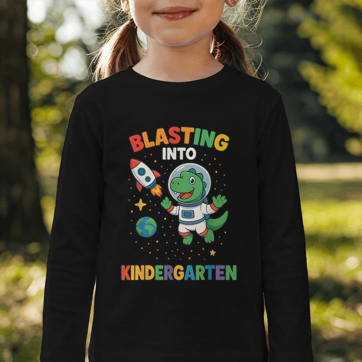 Blasting Into Kindergarten Dinosaur Astronaut Back To School Graphic Toddler Long Sleeve Tee Blasting Into Kindergarten Dinosaur Astronaut Back To School Graphic Toddler Long Sleeve Tee