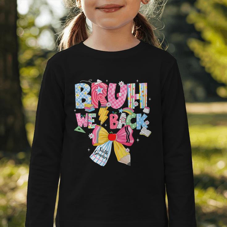 Bruh We Back Sixth Graders Back To School Coquette Bow Girl Graphic Toddler Long Sleeve Tee Bruh We Back Sixth Graders Back To School Coquette Bow Girl Graphic Toddler Long Sleeve Tee