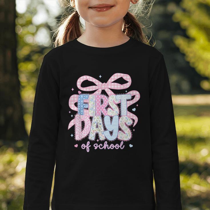 Coquette Bow Happy First Day Of School Back To School Retro Graphic Toddler Long Sleeve Tee Coquette Bow Happy First Day Of School Back To School Retro Graphic Toddler Long Sleeve Tee