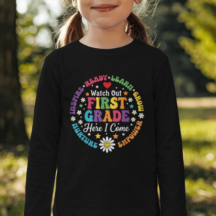 Cute Watch Out First Grade Here I Come Back To School Graphic Toddler Long Sleeve Tee Cute Watch Out First Grade Here I Come Back To School Graphic Toddler Long Sleeve Tee