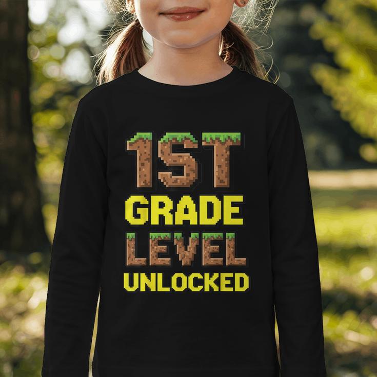 First Day Of 1st Grade Level Unlocked Back To School For Boy Graphic Toddler Long Sleeve Tee First Day Of 1st Grade Level Unlocked Back To School For Boy Graphic Toddler Long Sleeve Tee
