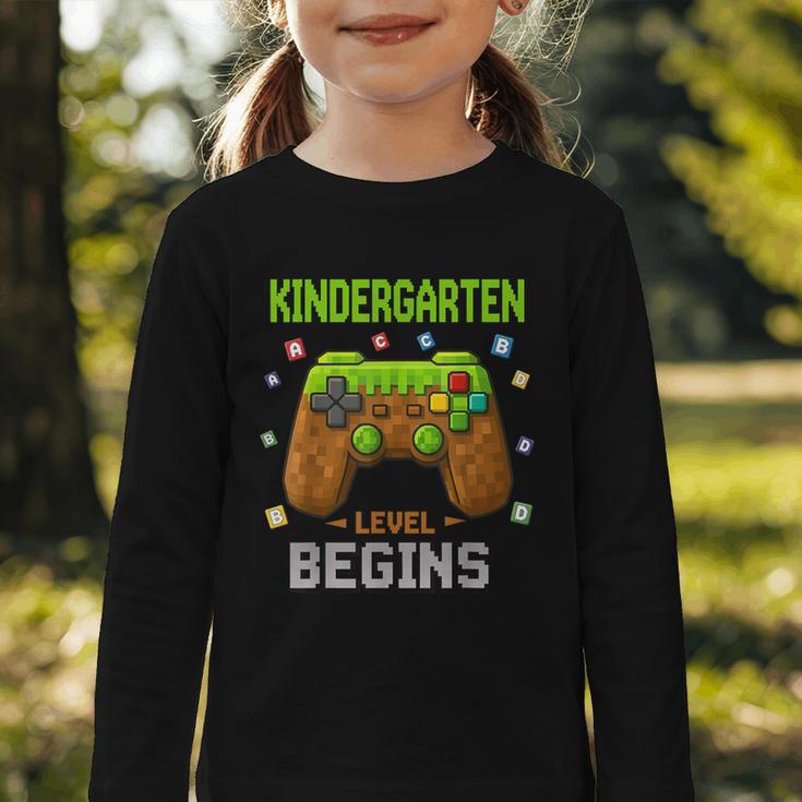First Day Of Kindergarten Level Begins Back To School Graphic Toddler Long Sleeve Tee First Day Of Kindergarten Level Begins Back To School Graphic Toddler Long Sleeve Tee