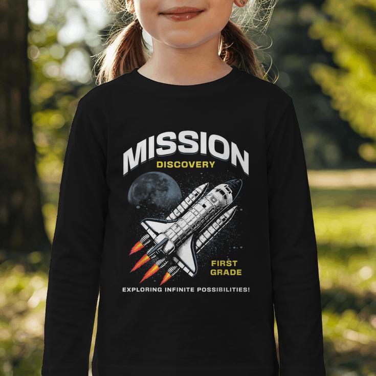 First Grade Back To School Space Rocket Astronaut Graphic Toddler Long Sleeve Tee First Grade Back To School Space Rocket Astronaut Graphic Toddler Long Sleeve Tee