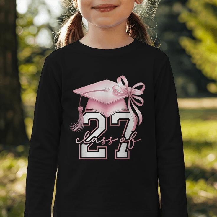 Girls Class Of 2027 Back To School Senior 2027 Coquette Bow Graphic Toddler Long Sleeve Tee Girls Class Of 2027 Back To School Senior 2027 Coquette Bow Graphic Toddler Long Sleeve Tee