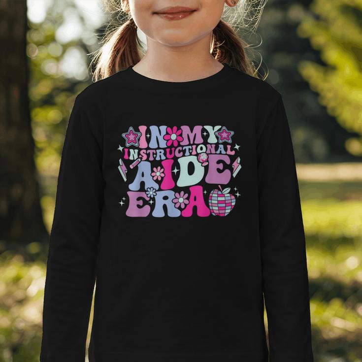 In My Instructional Aide Era Groovy Back To School Graphic Toddler Long Sleeve Tee In My Instructional Aide Era Groovy Back To School Graphic Toddler Long Sleeve Tee