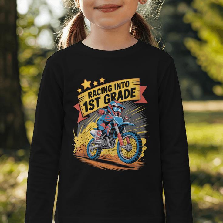 Motocross Dirt Bike Back To School Racing Into 1st Grade Graphic Toddler Long Sleeve Tee Motocross Dirt Bike Back To School Racing Into 1st Grade Graphic Toddler Long Sleeve Tee