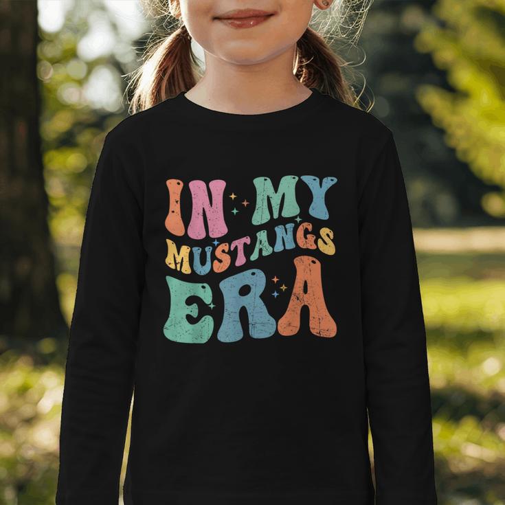 In My Mustangs Era Back To School Spirit Game Retro Groovy Graphic Toddler Long Sleeve Tee In My Mustangs Era Back To School Spirit Game Retro Groovy Graphic Toddler Long Sleeve Tee