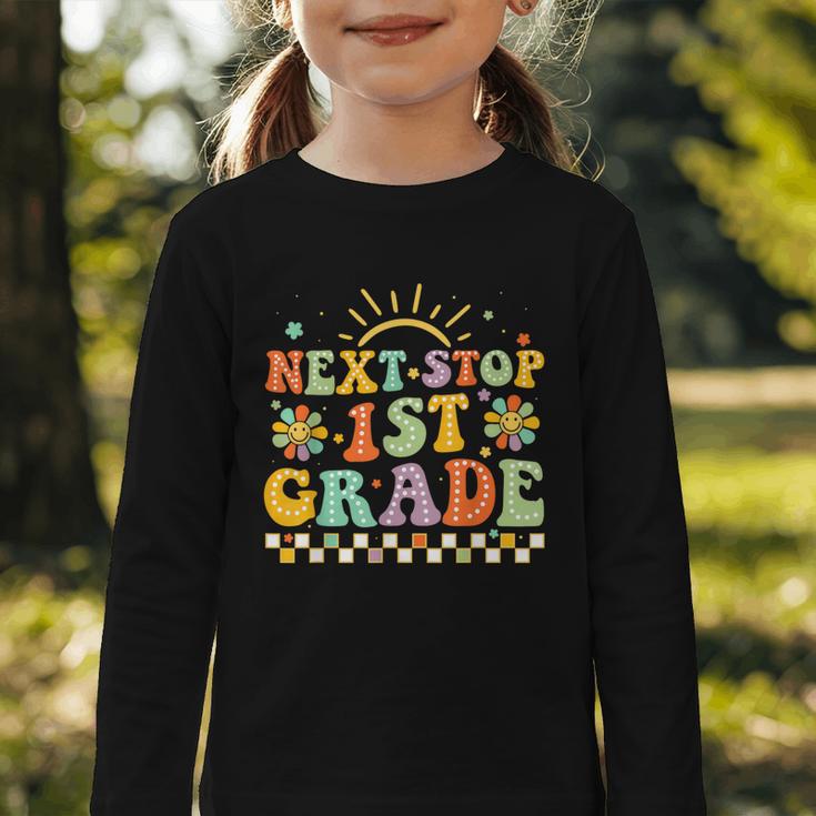 Next Stop 1st Grade Groovy Retro First Grade Back To School Graphic Toddler Long Sleeve Tee