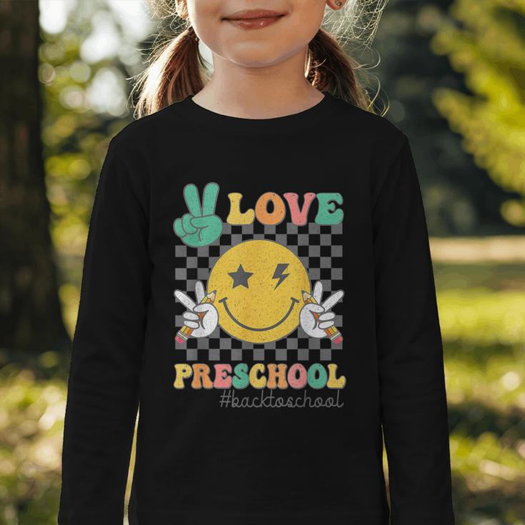 Peace Love Preschool Smile Face Back To School PRESCHOOL Graphic Toddler Long Sleeve Tee