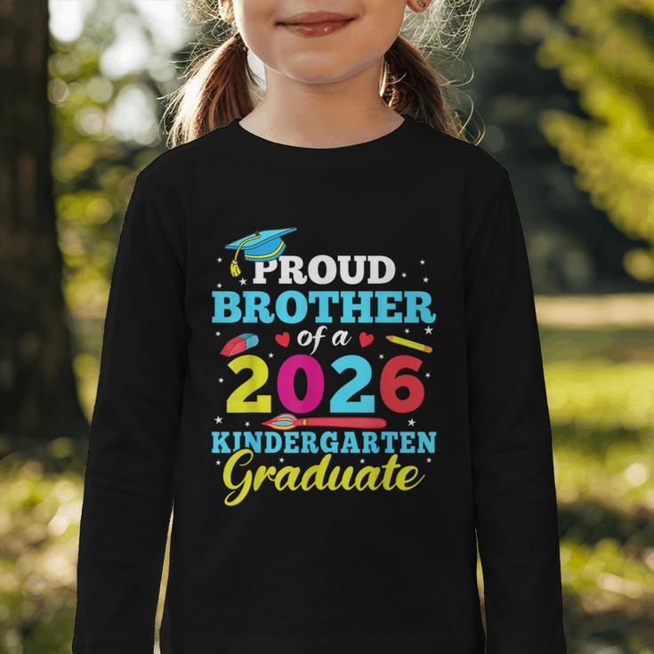 Proud Brother Of 2026 Kindergarten Graduate Back To School Graphic Toddler Long Sleeve Tee Proud Brother Of 2026 Kindergarten Graduate Back To School Graphic Toddler Long Sleeve Tee