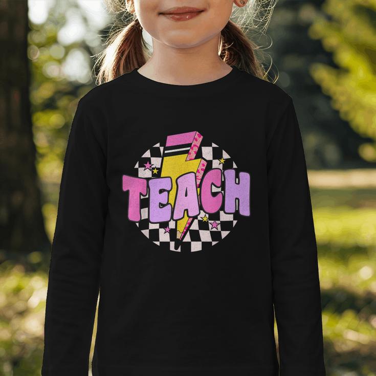 Retro Checkered Teach Pencil Lightning Back To School Graphic Toddler Long Sleeve Tee Retro Checkered Teach Pencil Lightning Back To School Graphic Toddler Long Sleeve Tee
