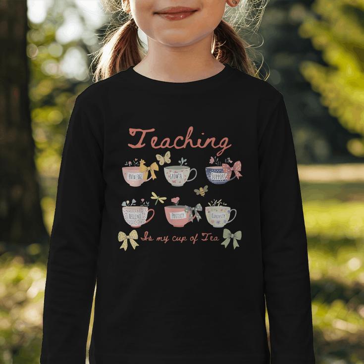 Teaching Is My Cup Of Tea Coquette Bow Floral Back To School Graphic Toddler Long Sleeve Tee Teaching Is My Cup Of Tea Coquette Bow Floral Back To School Graphic Toddler Long Sleeve Tee