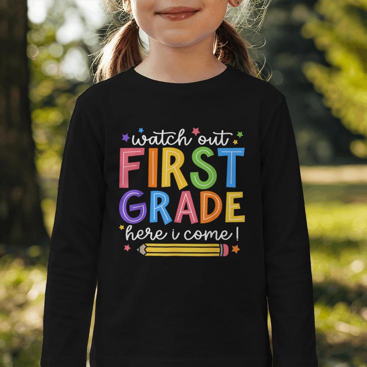 Watch Out First Grade Here I Come 1St Grade Back To School Graphic Toddler Long Sleeve Tee