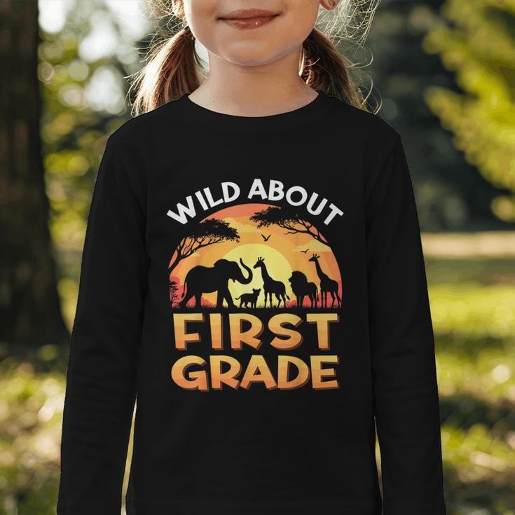 Wild About First Grade Zoo Animals Back To School Safari Graphic Toddler Long Sleeve Tee Wild About First Grade Zoo Animals Back To School Safari Graphic Toddler Long Sleeve Tee