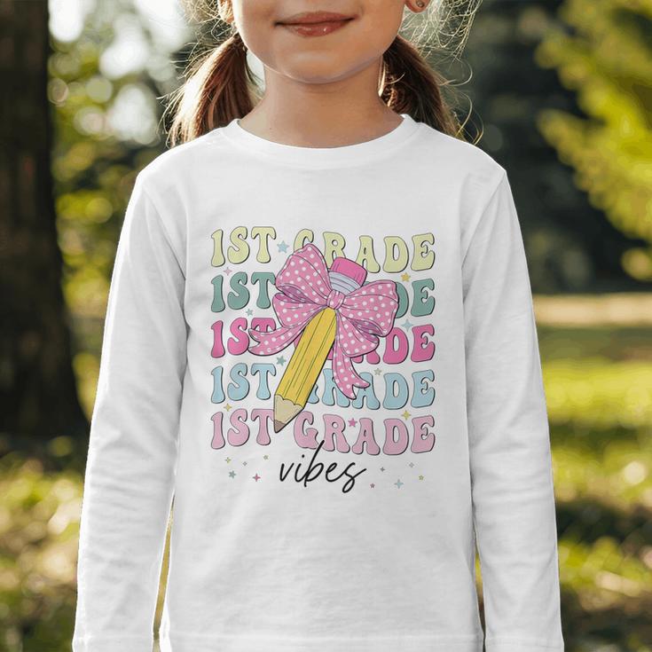 1st Grade Vibes Girl Coquette Bow First Grade Back To School Graphic Toddler Long Sleeve Tee 1st Grade Vibes Girl Coquette Bow First Grade Back To School Graphic Toddler Long Sleeve Tee