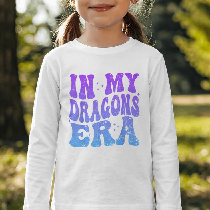 In My Dragons Era Back To School Spirit Game Retro Groovy Graphic Toddler Long Sleeve Tee In My Dragons Era Back To School Spirit Game Retro Groovy Graphic Toddler Long Sleeve Tee