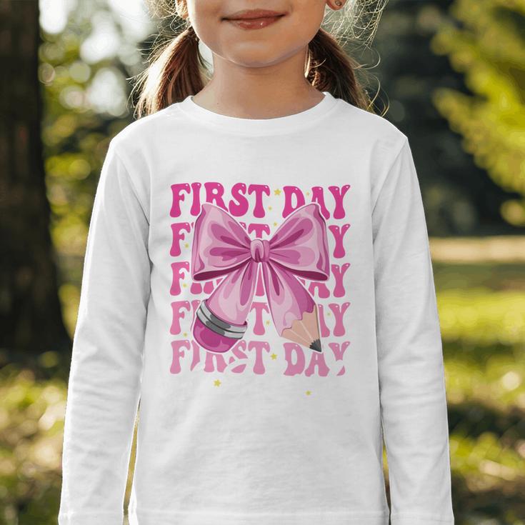 First Day Of School Girls Coquette Bow Back To School Performance Graphic Toddler Long Sleeve Tee First Day Of School Girls Coquette Bow Back To School Performance Graphic Toddler Long Sleeve Tee