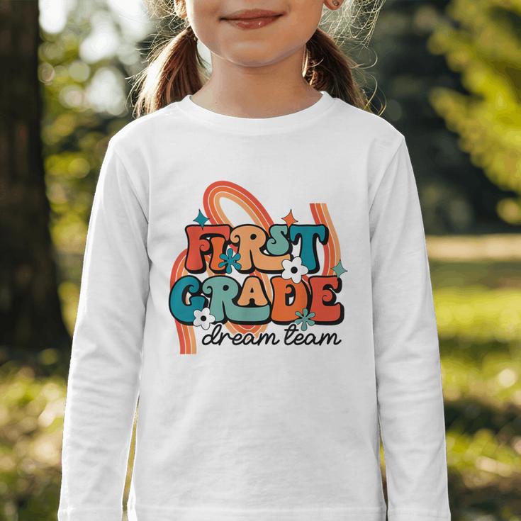 First Grade Dream Team First Day Of 1st Grade Back To School Graphic Toddler Long Sleeve Tee First Grade Dream Team First Day Of 1st Grade Back To School Graphic Toddler Long Sleeve Tee
