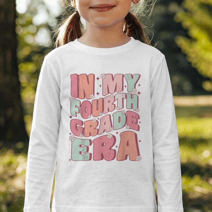 In My Fourth Grade Era Cute Groovy 4th Grade Back To School Graphic Toddler Long Sleeve Tee In My Fourth Grade Era Cute Groovy 4th Grade Back To School Graphic Toddler Long Sleeve Tee