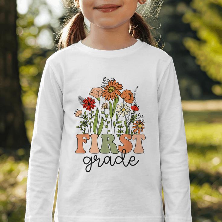 Groovy First Grade Wildflowers Back To School 1st Grade Graphic Toddler Long Sleeve Tee