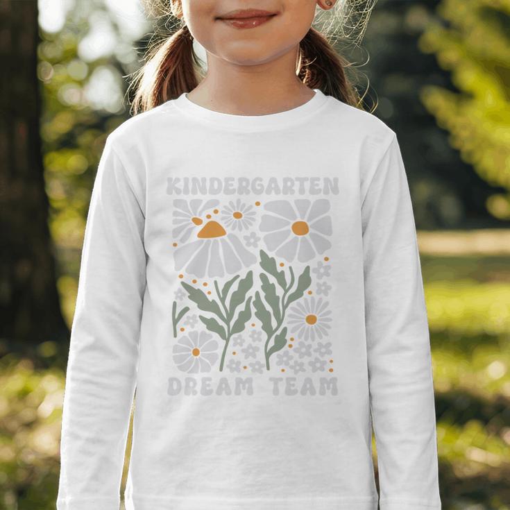Kindergarten Dream Team First Day Back To School Boho Flower Performance Graphic Toddler Long Sleeve Tee Kindergarten Dream Team First Day Back To School Boho Flower Performance Graphic Toddler Long Sleeve Tee