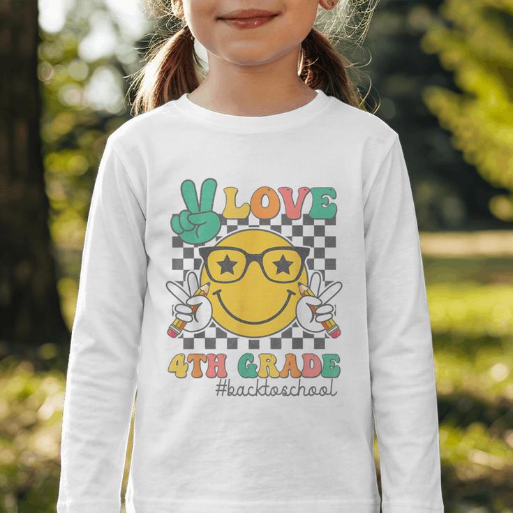 Peace Love 4th Grade Cute Smile Face Back To School Girls Graphic Toddler Long Sleeve Tee Peace Love 4th Grade Cute Smile Face Back To School Girls Graphic Toddler Long Sleeve Tee