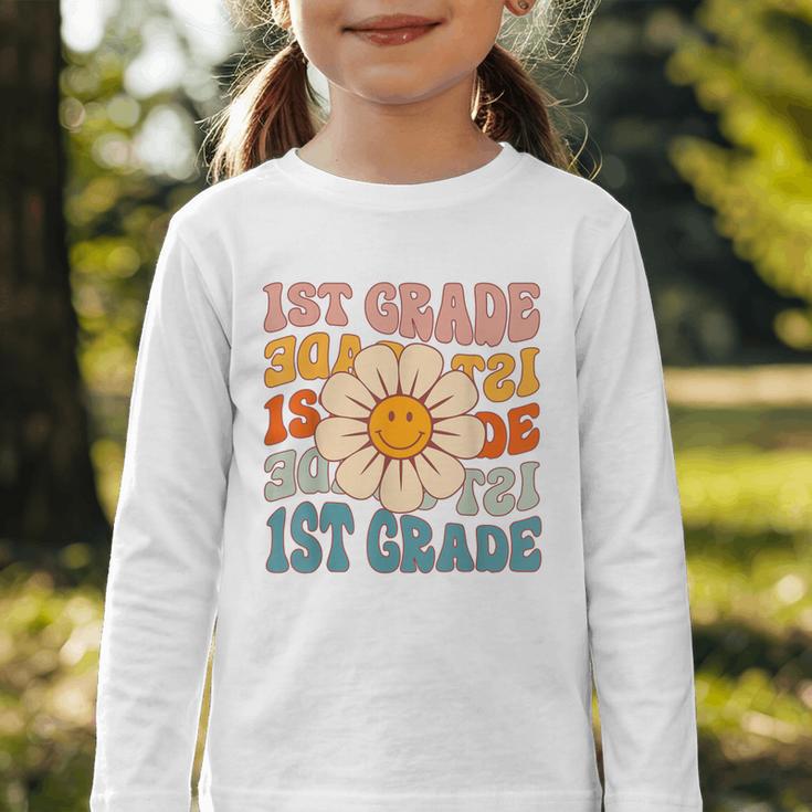 Retro 1st Grade Daisy Colorful Back To School First Grade Graphic Toddler Long Sleeve Tee Retro 1st Grade Daisy Colorful Back To School First Grade Graphic Toddler Long Sleeve Tee