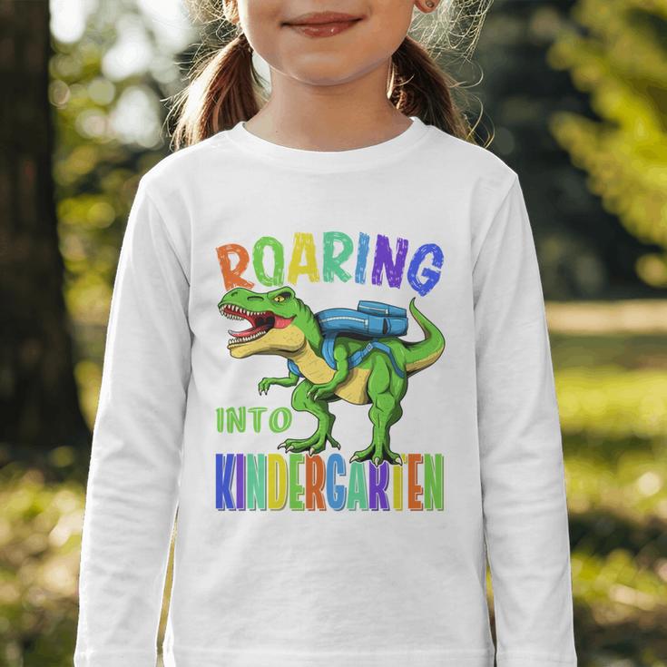 Roaring Into Kindergarten DinosaurRex Back To School Boys Performance Graphic Toddler Long Sleeve Tee Roaring Into Kindergarten DinosaurRex Back To School Boys Performance Graphic Toddler Long Sleeve Tee