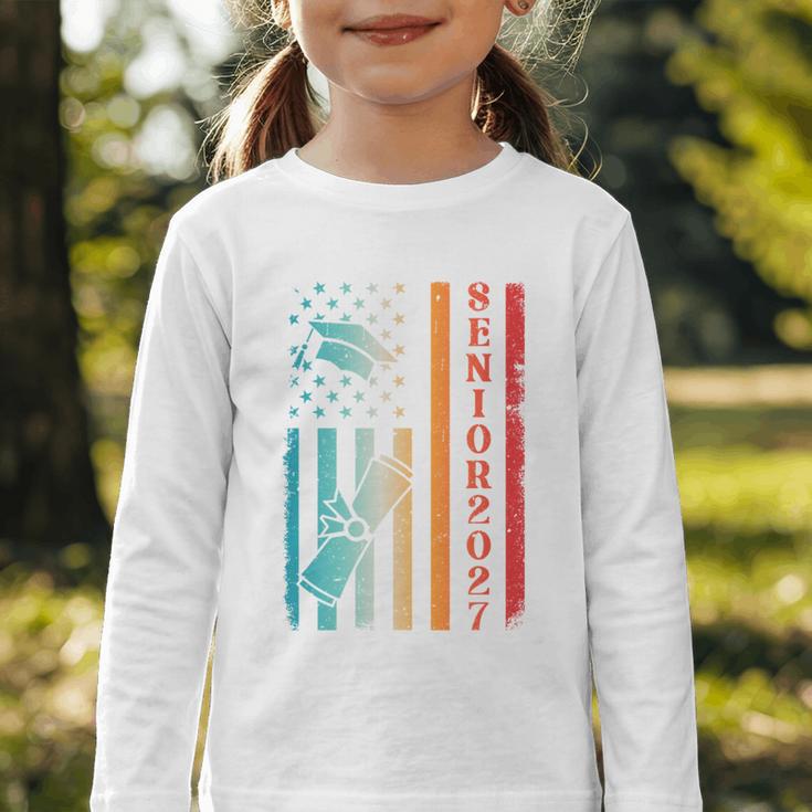 Senior 2027 Class Of 2027 Graduation USA Flag Back To School Performance Graphic Toddler Long Sleeve Tee