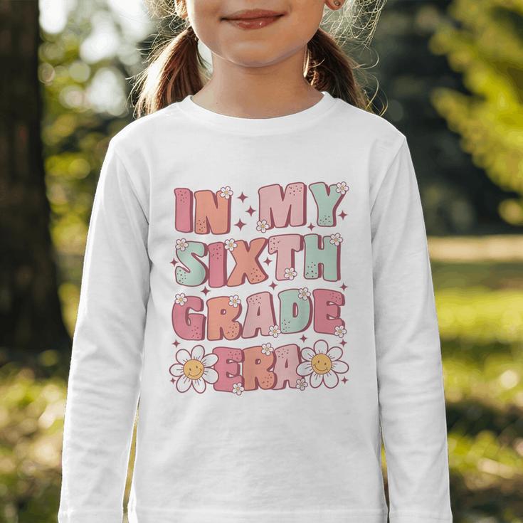 In My Sixth Grade Era Cute Groovy 6th Grade Back To School Graphic Toddler Long Sleeve Tee