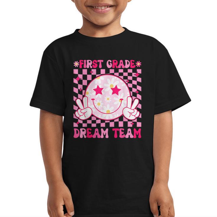 Groovy First Grade Dream Team Back To School 1st Grade Squad Graphic Kid T-Shirt