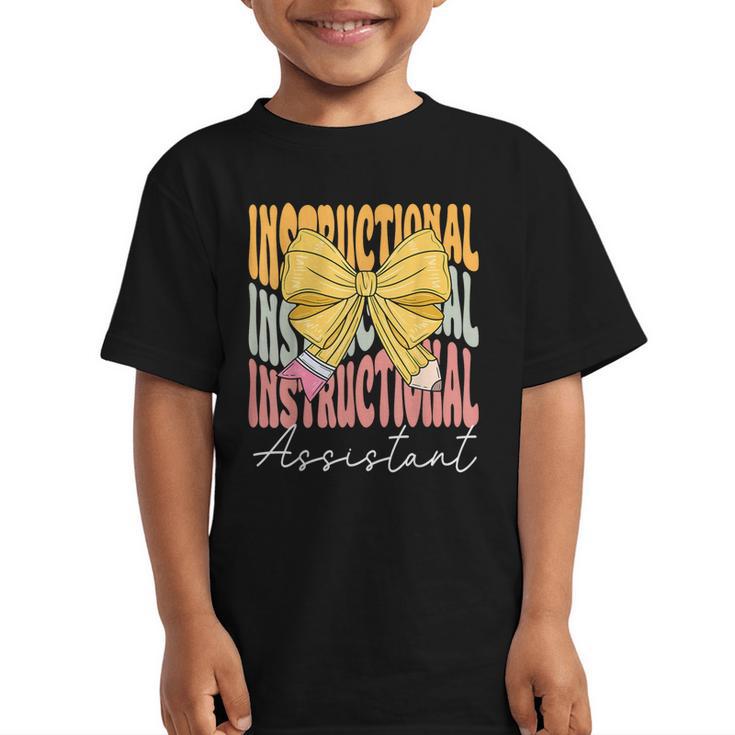 Instructional Assistant Groovy Coquette Bow Back To School Graphic Kid T-Shirt