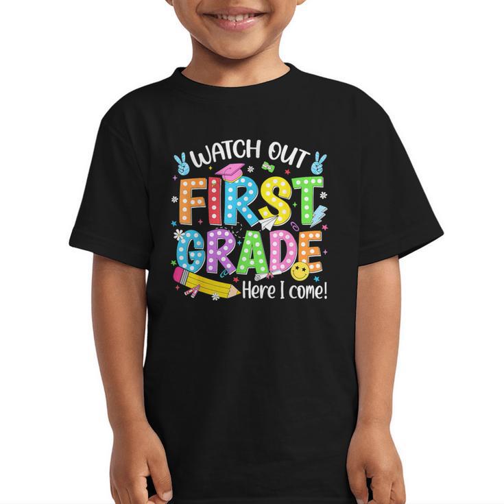 Watch Out First Grade Here I Come Back To School 1st Grade Graphic Kid T-Shirt