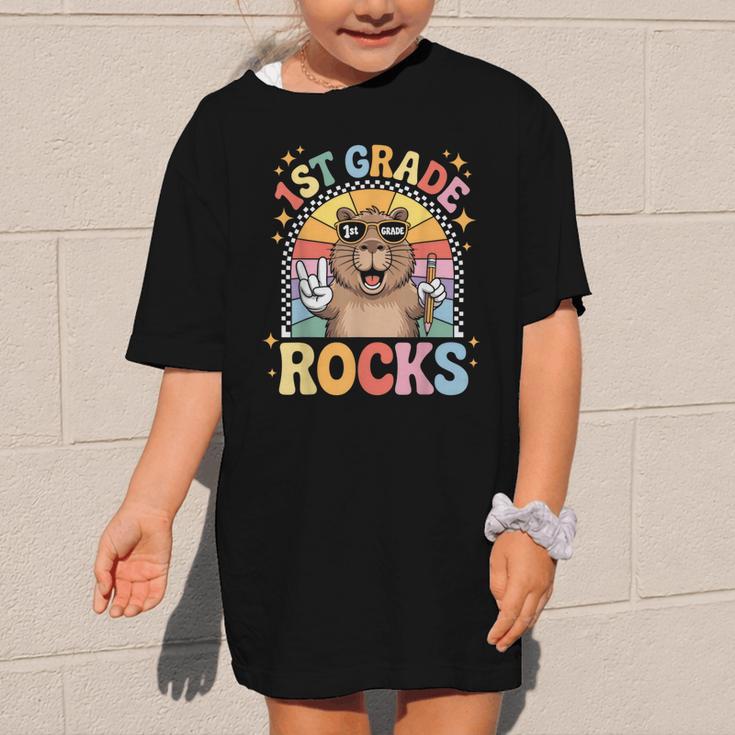 Back To School 1st Grade Capybara First Grade Rocks Graphic Kid T-Shirt Back To School 1st Grade Capybara First Grade Rocks Graphic Kid T-Shirt