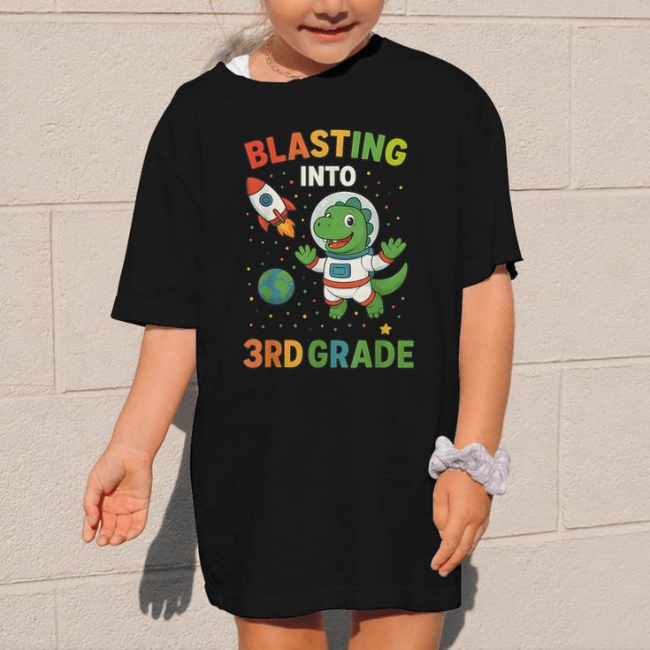 Blasting Into 3rd Grade Dinosaur Astronaut Back To School Graphic Kid T-Shirt Blasting Into 3rd Grade Dinosaur Astronaut Back To School Graphic Kid T-Shirt