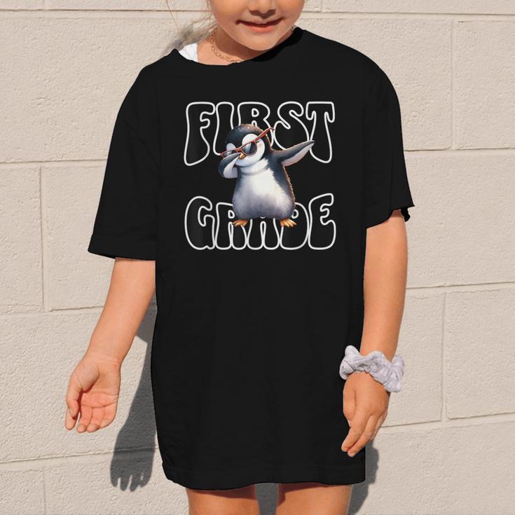 Cute Dabbing Penguin First Grade Back To School Graphic Kid T-Shirt Cute Dabbing Penguin First Grade Back To School Graphic Kid T-Shirt