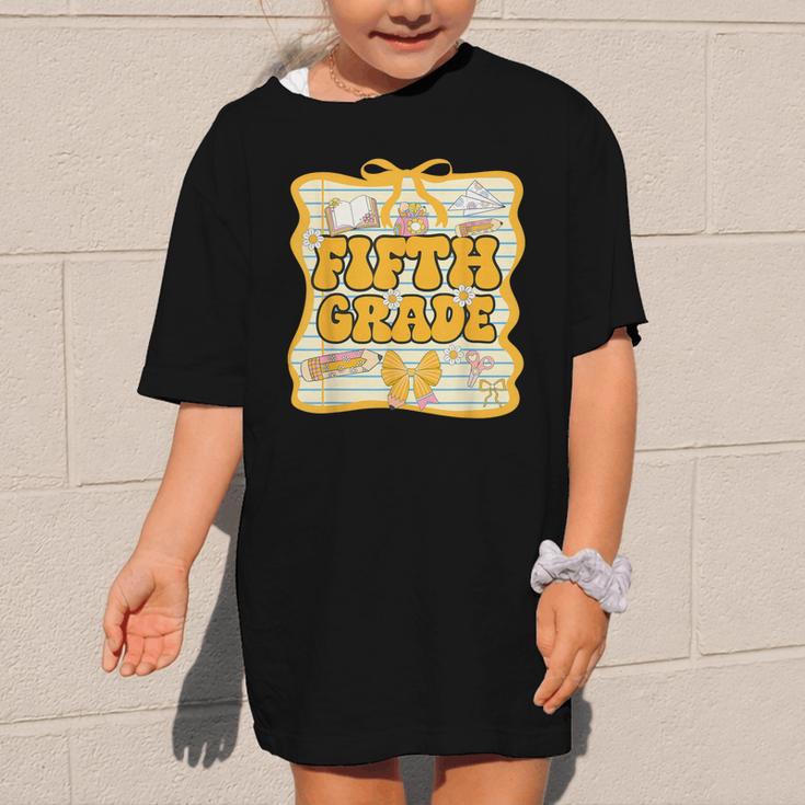 Fifth Grade Back To School Kids Girls Bow 5th Grade Groovy Graphic Kid T-Shirt Fifth Grade Back To School Kids Girls Bow 5th Grade Groovy Graphic Kid T-Shirt