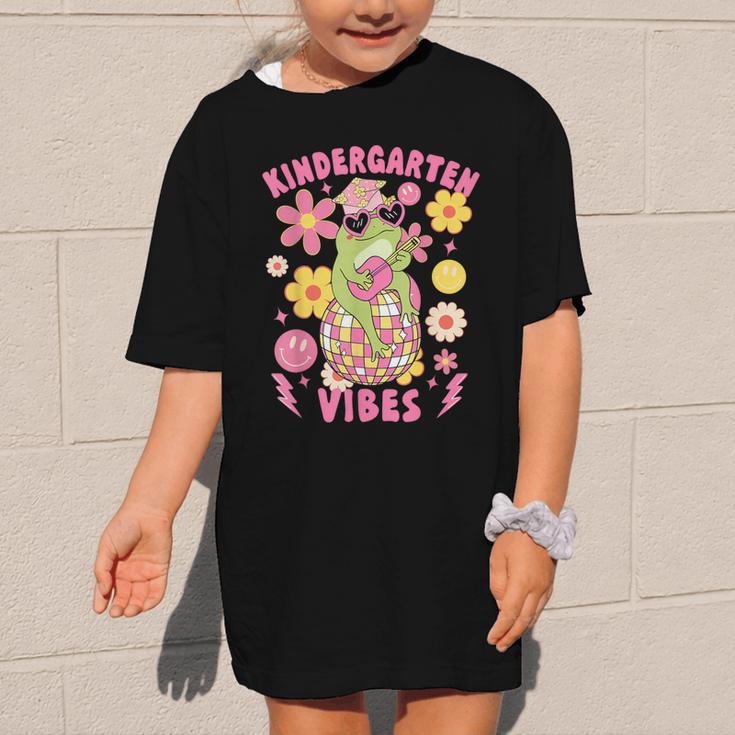 Kindergarten Vibes Groovy Kindergarten Back To School Frog Graphic Kid T-Shirt Kindergarten Vibes Groovy Kindergarten Back To School Frog Graphic Kid T-Shirt